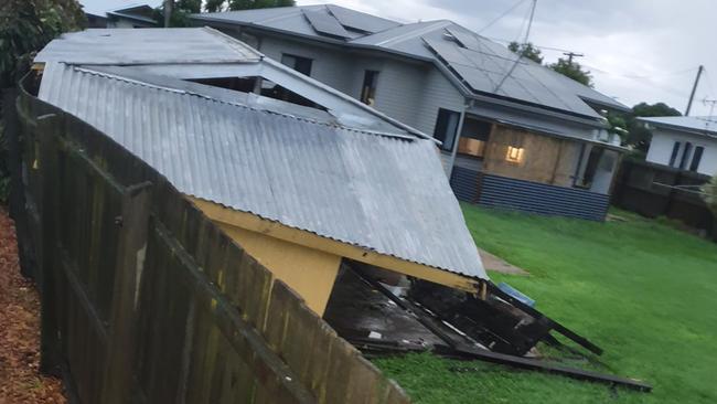 Mark Ross: Neighbour's shed blew down and pushing fence over.