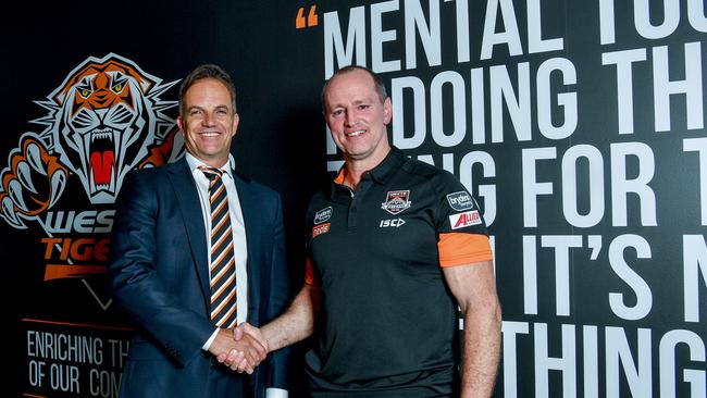 Wests Tigers' CEO Justin Pascoe (left) and Wests Tigers' new coach Michael Maguire (right) are seen at a Tigers press conference in Sydney, Monday, November 19, 2018. (AAP Image/Brendan Esposito) NO ARCHIVING