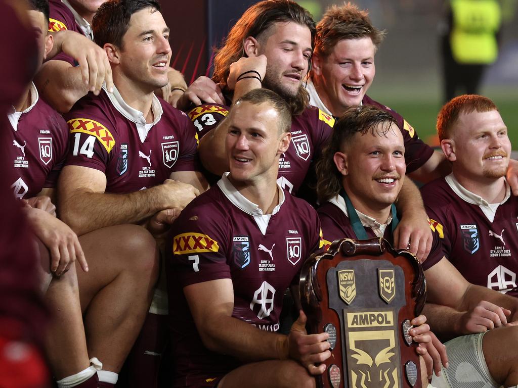 Daly Cherry-Evans of the Maroons celebrates with teammates including Sarina’s Reuben Cotter on his left after winning the series 2-1 after game three of the State of Origin series between New South Wales Blues and Queensland Maroons at Accor Stadium on July 12, 2023 in Sydney, Australia. Picture: Mark Kolbe/Getty Images)