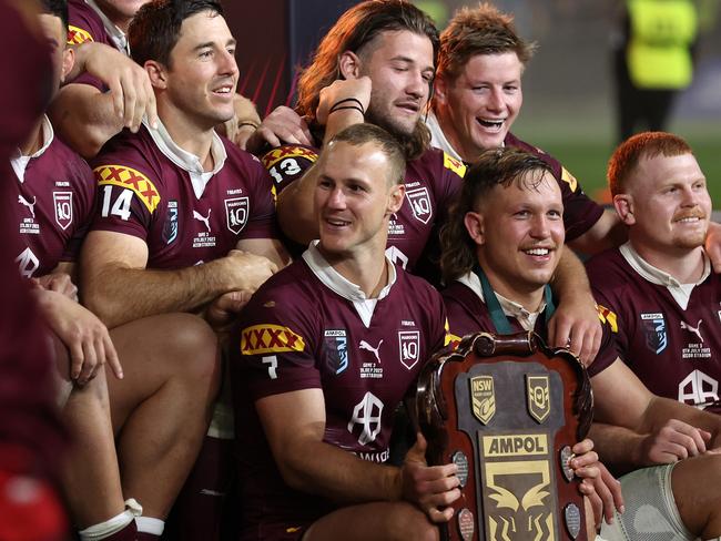 Daly Cherry-Evans of the Maroons celebrates with teammates including Sarina’s Reuben Cotter on his left after winning the series 2-1 after game three of the State of Origin series between New South Wales Blues and Queensland Maroons at Accor Stadium on July 12, 2023 in Sydney, Australia. Picture: Mark Kolbe/Getty Images)