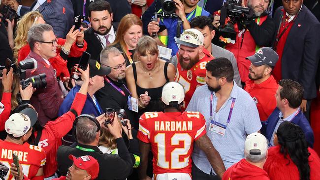 Mecole Hardman Jr of the Kansas City Chiefs celebrates with Travis Kelce and Taylor Swift after defeating the San Francisco 49ers 25-22 during Super Bowl LVIII at Allegiant Stadium on February 11, 2024 in Las Vegas, Nevada. Picture: Getty Images via AFP