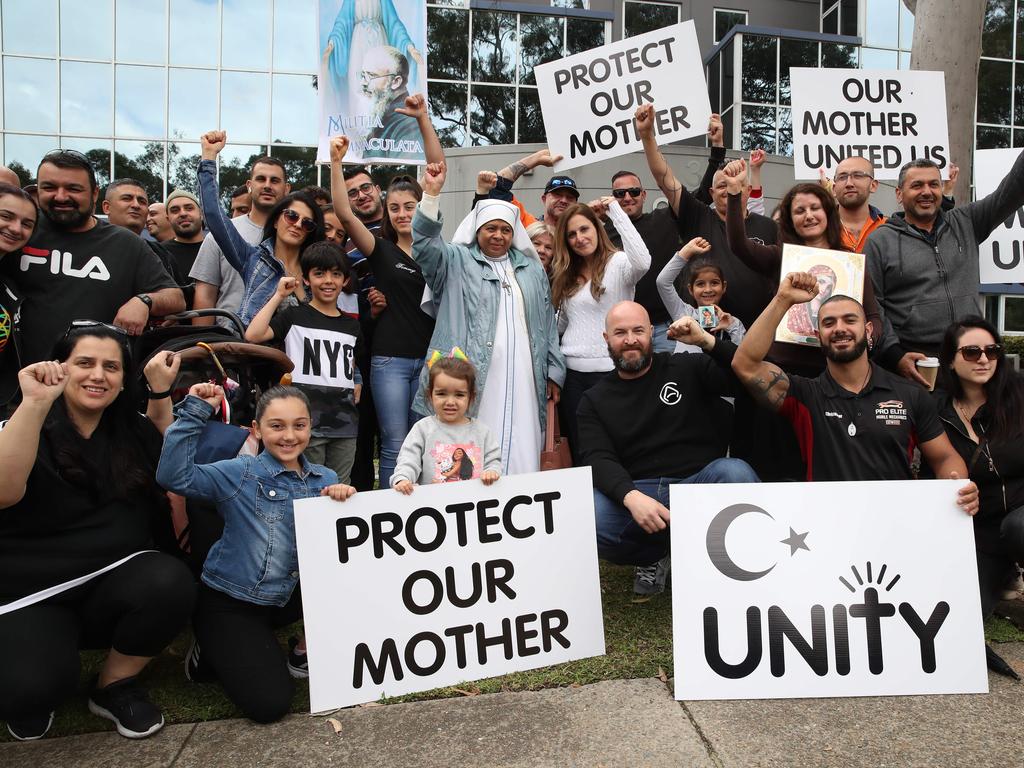 Protestors have begun to gather outside Kiis FM headquarters in North Ryde to protest against comments Kyle Sandilands made about Christians and the Virgin Mary. Protest leader Georgie Mark speaks to the protestors. Picture: David Swift.