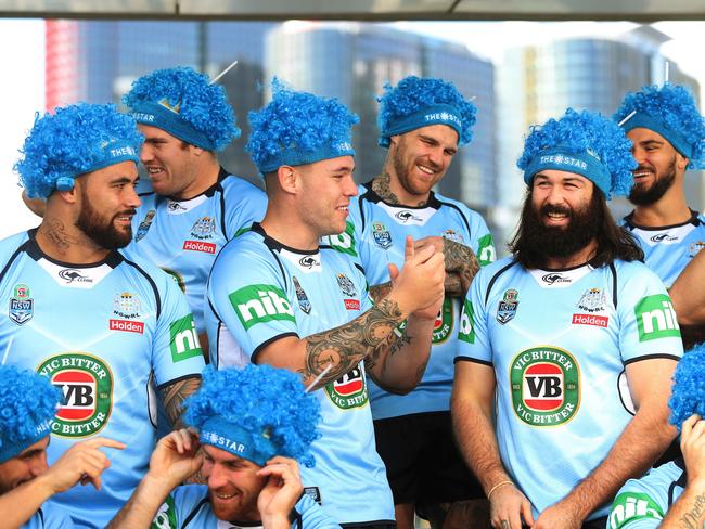 Blues big boppers Andrew Fifita, David Klemmer and Aaron Woods model their fan wigs. Picture: Brett Costello