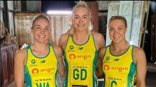 Australian Diamonds netballers Lizzy Watson, Jo Weston and Kate Moloney with their uniforms featuring the Hancock Prospecting logo. Picture: instagram