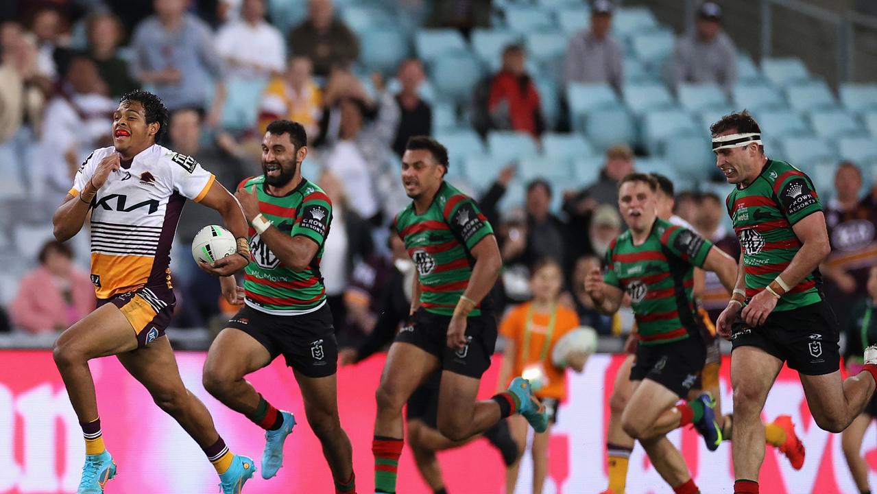 Selwyn Cobbo of the Broncos runs away from chasing South Sydney players Photo by Cameron Spencer/Getty Images)
