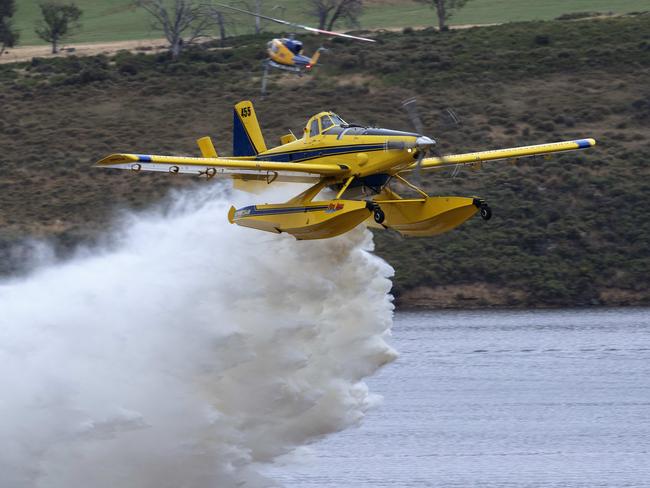 An Air Tractor Fire Boss showing its abilities at the aviation firefighting fleet demonstration at Colebrook. Picture: Chris Kidd