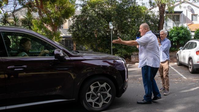 Liberal Reid MP Fiona Martin appears to try and leave her campaign event in Cabarita Park but ‘Aussie Cossack’ Simeon Boikov stands in her path. Picture: Supplied