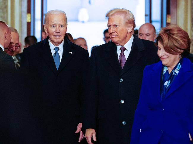 Joe Biden and Donald Trump walking into the inauguration ceremony together. Picture: AFP