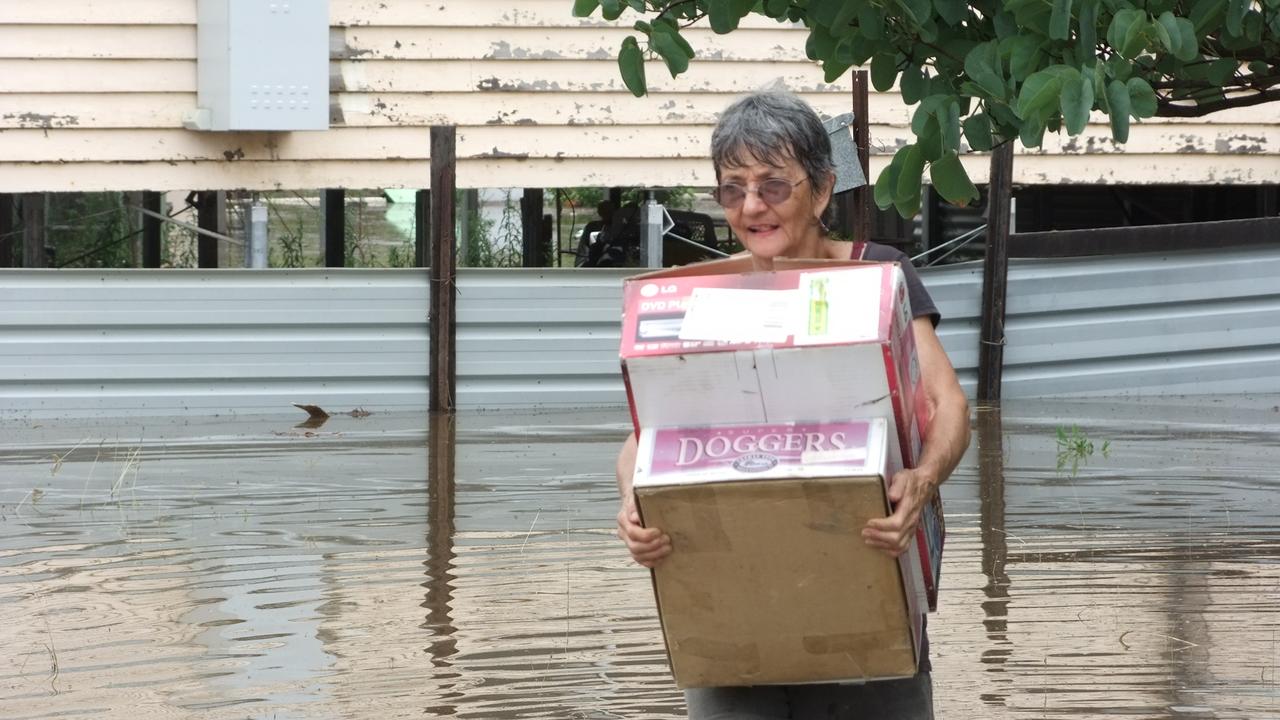 Mrs Mayfield of Mundubbera evacuating her house. Photo: Sue Harris/Central &amp; North Burnett Times