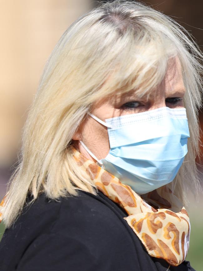 Amanda Dyer is seen outside the Adelaide Magistrates Court. She has pleaded guilty to eight charges of theft stealing over $1.3m. Picture: NCA NewsWire/David Mariuz