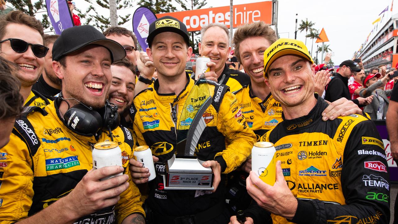 Slade celebrates with the BJR crew after Race 32. Picture: Daniel Kalisz