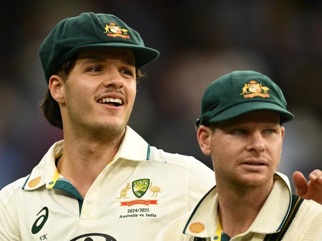 MELBOURNE, AUSTRALIA - DECEMBER 28: Sam Konstas of Australia and Steve Smith of Australia look on during day three of the Men's Fourth Test Match in the series between Australia and India at Melbourne Cricket Ground on December 28, 2024 in Melbourne, Australia. (Photo by Quinn Rooney/Getty Images)