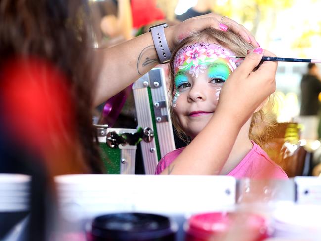 Ava Rose Lakeman enjoying getting her face painted at the Royal Easter Show. Picture: .Jane Dempster/The Sunday Telegraph.