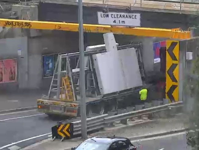 The concrete truck wedged under the Napier St bridge on February 21.