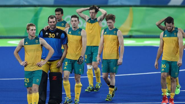 A dejected Kokaburras outfit leave the pitch after their 4-0 defeat to the Netherlands. Picture: Getty Images