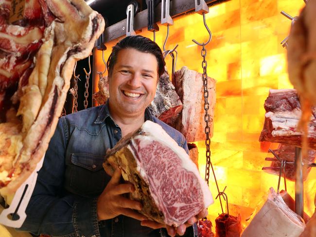 Anthony Puharich with a $500 per kg piece of steak at Victor Churchill's butchers in Woollahra, Sydney. It is Australias most expensive steak ever sold, from Victorian cattleman, David Blackmore. Picture: James Croucher