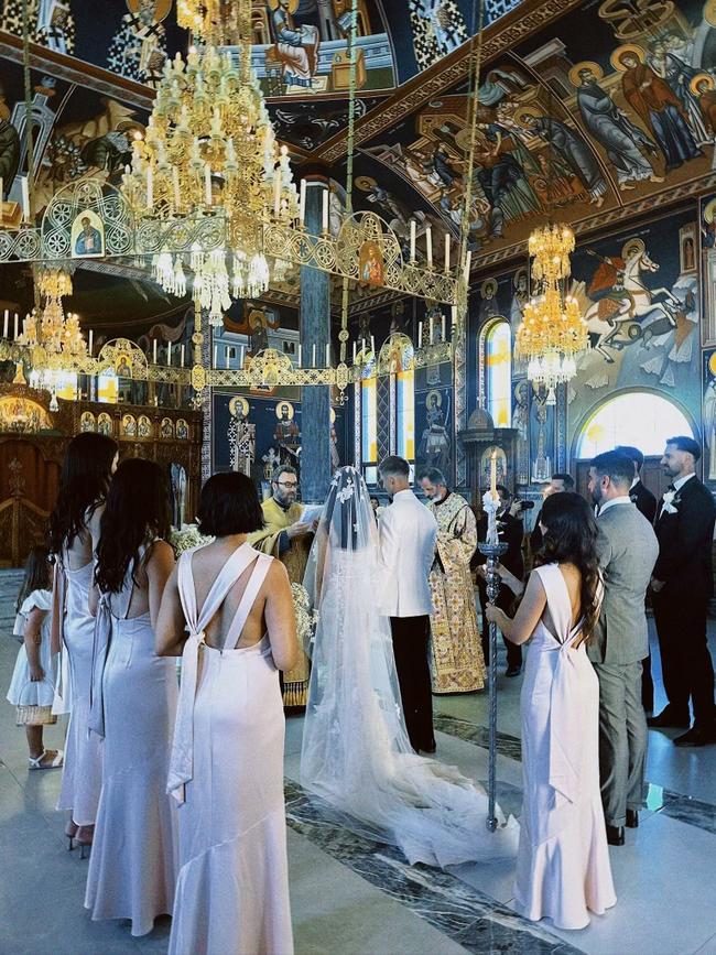 Hartlett and Ms Gvozdenovic during their traditional Serbian Orthodox ceremony at the Woodville South church. Picture: Supplied