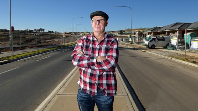 Horticulturalist Tim Pickles has called on developers to better protect the environment after countless trees were removed from the new Emerald Hills estate. Picture: Simon Bullard