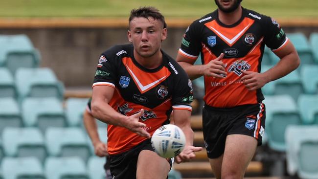 Cayne Nicholas barged over from dummy half for the Tigers. Picture: Balmain Tigers