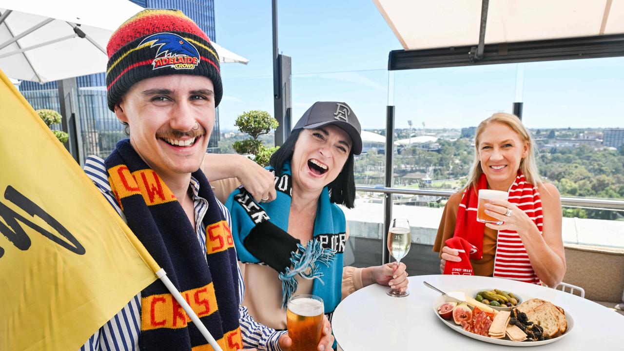 Trent Mahony, Kerry Bray and Alex Pledge at 2KW preparing for the AFL Gather Round weekend. Picture: Brenton Edwards