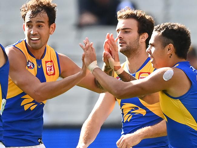 MELBOURNE, AUSTRALIA - MAY 09: Jamaine Jones of the Eagles is congratulated by team mates after kicking a goal during the round eight AFL match between the Hawthorn Hawks and the West Coast Eagles at Melbourne Cricket Ground on May 09, 2021 in Melbourne, Australia. (Photo by Quinn Rooney/Getty Images)