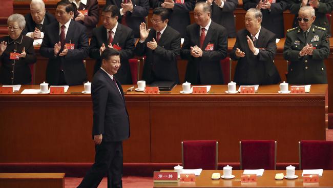 Chinese President Xi Jinping arrives for the opening session of China's 19th Party Congress at the Great Hall of the People in Beijing earlier today.