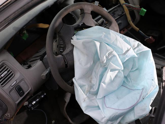 MEDLEY, FL - MAY 22: A deployed airbag is seen in a 2001 Honda Accord at the LKQ Pick Your Part salvage yard on May 22, 2015 in Medley, Florida. The largest automotive recall in history centers around the defective Takata Corp. air bags that are found in millions of vehicles that are manufactured by BMW, Chrysler, Daimler Trucks, Ford, General Motors, Honda, Mazda, Mitsubishi, Nissan, Subaru and Toyota.   Joe Raedle/Getty Images/AFP
