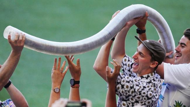 Fans form a beer snake at the MCG as Australia took on New Zealand