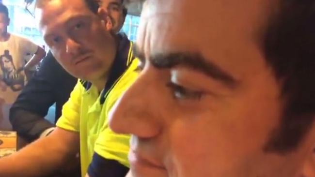 I am curious, yellow: Sam Dastyari laughs off racist taunts and rude questions from far-right group ‘Patriot Blue’ in a Melbourne pub. Picture: Facebook