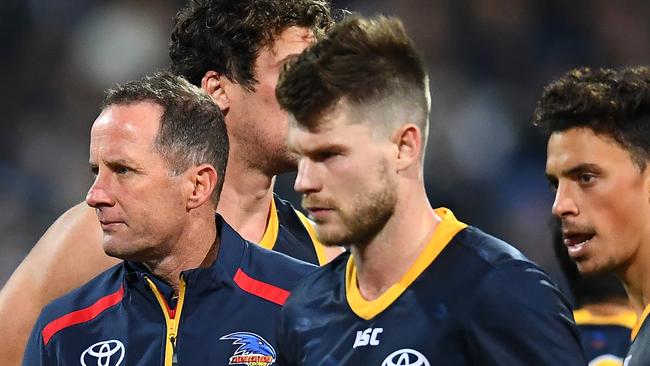 Bryce Gibbs walks off alongside coach Don Pyke on Friday night. Picture: Quinn Rooney/Getty Images.