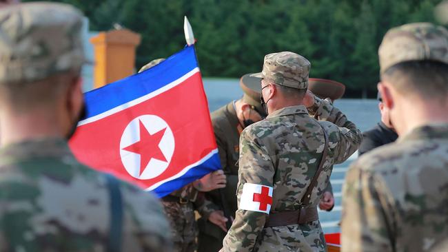 State-released image of military medical field officers of the Korean People's Army going to supply medicines in response to the country’s Covid-19 outbreak. Picture: Supplied