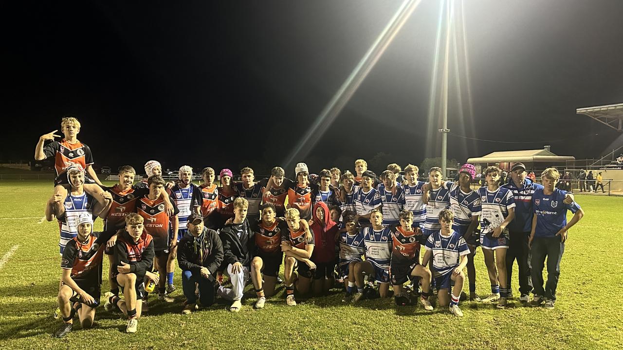 Southern Suburbs Tigers under-14 TJRL side with Warwick Collegians players after a trial game.