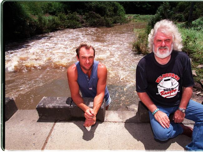 02/02/1999. David Stubbs (R) with 1970s singer Brian Cadd, whom he rescued with his partner from flooded Gold Coast creek, Cadd/Singer Queensland / Weather / Flood