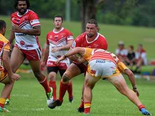 South Grafton Rebels captain Grant Stevens runs into a Matt Cheeseman tackle against the Coffs Harbour Comets. Group 2 rugby league 26 March 2017 Geoff King Motors Park. Picture: Brad Greenshields