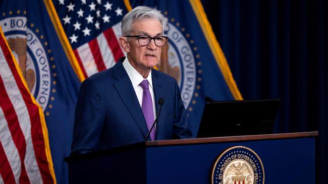 TOPSHOT - US Federal Reserve chair Jerome Powell holds a news conference after a Federal Open Market Committee meeting in Washington, DC, on January 31, 2024. Powell signaled Wednesday that an interest rate cut as soon as in March is unlikely, as the central bank remains data-dependent when mulling its next steps. Powell said the Fed's rate-setting committee plans to "move carefully" and added: "Based on the meeting today, I would tell you that I don't think it's likely that the committee will reach a level of confidence, by the time of the March meeting, to identify March as the time to do that." (Photo by Julia Nikhinson / AFP)