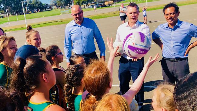 Canterbury Bankstown Mayor Khal Asfour, Blaxland federal Labor MP Jason Clare and Labor Candidate for Banks Chris Gambian at Deverall Park netball courts in Bankstown to announce $350,000 in funding during the election.