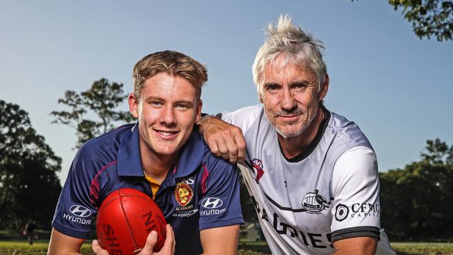 Former Brisbane player Adrian Fletcher alongside son Jaspa Fletcher, who is part of the Lions Academy. Picture: Zak Simmonds