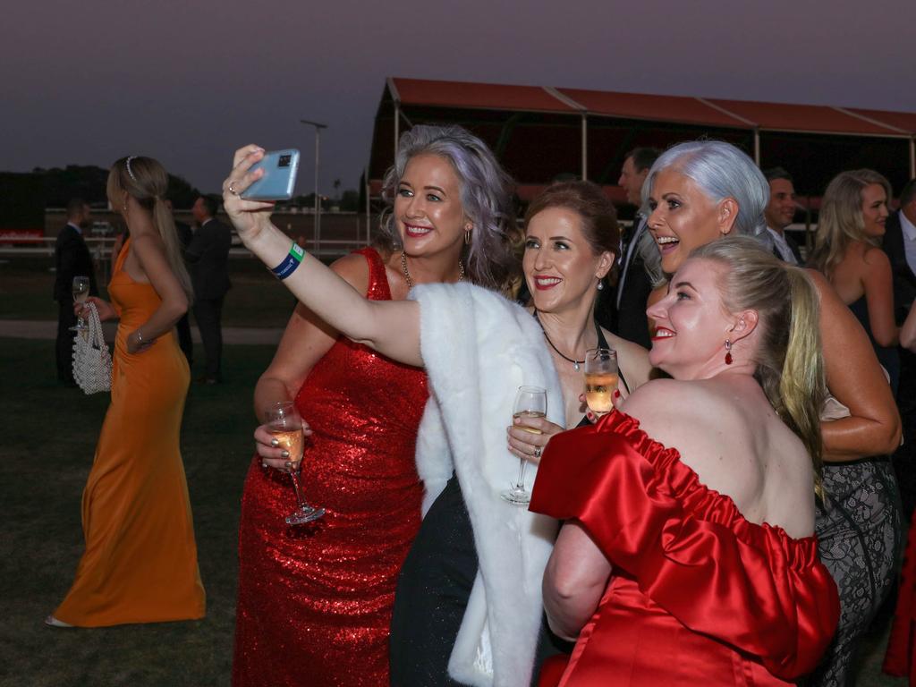 Selfie time at the Darwin Turf Club Gala Ball. Picture: Glenn Campbell