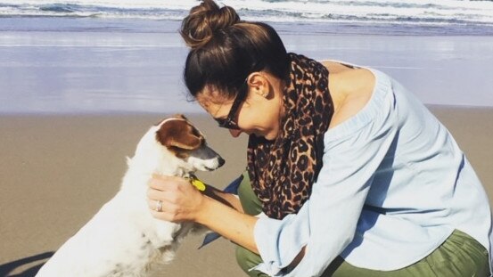 Strong bond: Giaan Rooney with her rescue dog Lester at the Gold Coast.