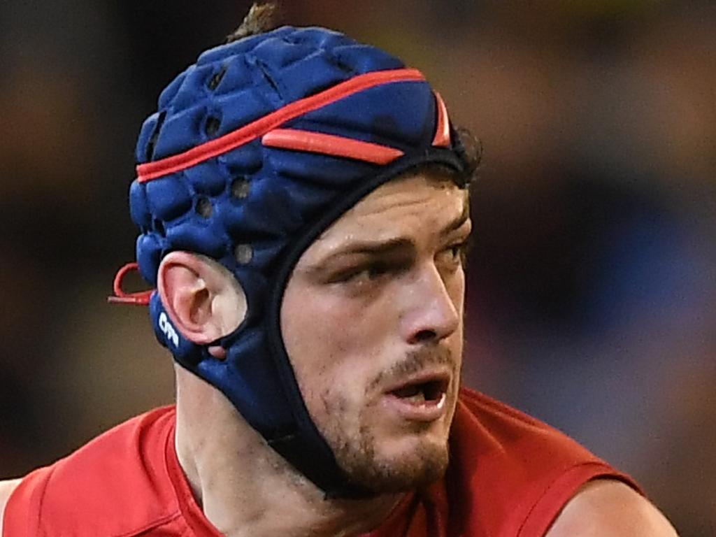 Angus Brayshaw of the Demons (left) and Bachar Houli of the Tigers contest the Round 20 AFL match between the Melbourne Demons and the Richmond Tigers at the MCG in Melbourne, Saturday, August 3, 2019.  (AAP Image/Julian Smith) NO ARCHIVING, EDITORIAL USE ONLY