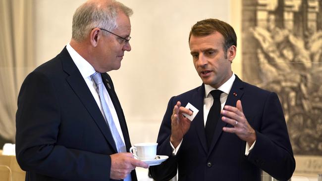 Australian Prime Minister Scott Morrison and French President Emmanuel Macron talk before a G20 leaders meeting. Picture: Adam Taylor