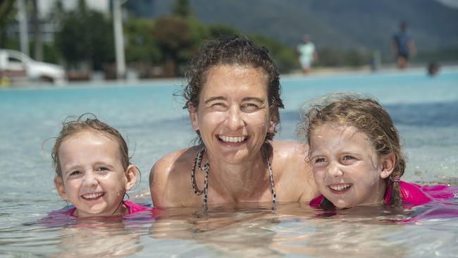 Cairns mum Emily Welham swims at the Lagoon with daughters Leuca (2) and Kambelle (5). Picture: Brian Cassey