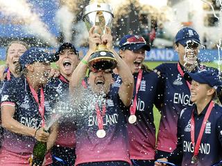 England players celebrate with the trophy after winning the ICC Women's World Cup 2017 final match against India at Lord's in London, England, Sunday, July 23, 2017. (AP Photo/Rui Vieira)