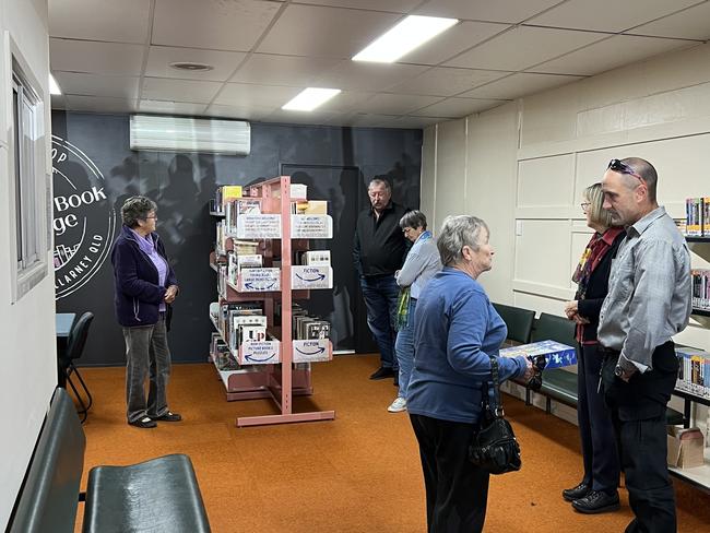 Community members taking their first browse through the collections at Killarney Co-op's Book Exchange.