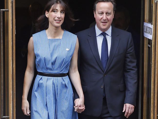 Britain's Prime Minister David Cameron and his wife Samantha leave after voting in the EU referendum in London, Thursday June 23, 2016. Polls opened in Britain Thursday for a referendum on whether the country should quit the European Union bloc of which it has been a member for 43 years. (AP Photo/Alastair Grant)