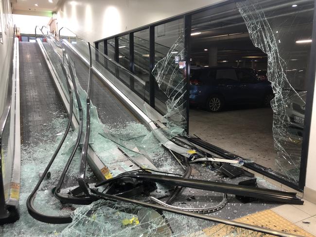 A car crashed through the glass sliding doors at Glenorchy Plaza. Photo: Jarrod Lawler