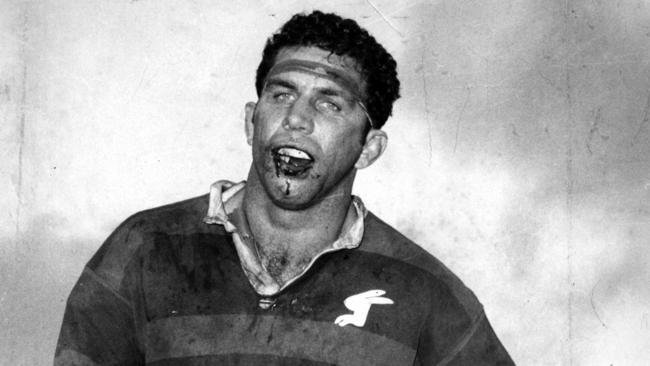 John Sattler, with his jaw broken, is chaired from the field after Souths’ 1970 grand final win.