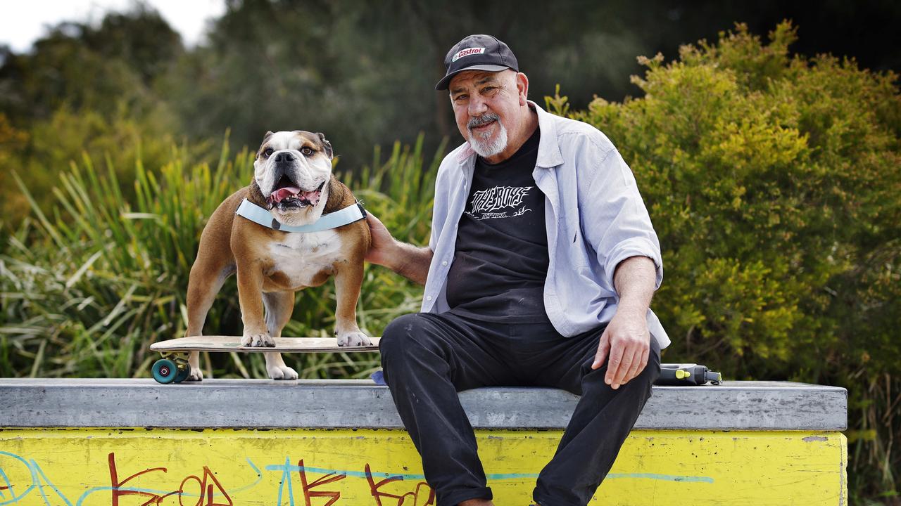 Giotto the skateboarding bulldog pictured in Kurnell today with owner Greg Denaro. Picture: Sam Ruttyn