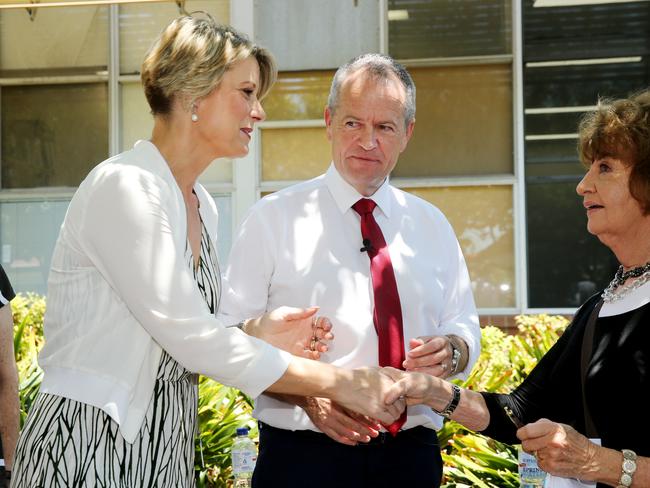 ALP candidate Kristina Keneally and Opposition Leader Bill Shorten speak to voters at Ryde Hospital yesterday. Picture: Richard Dobson