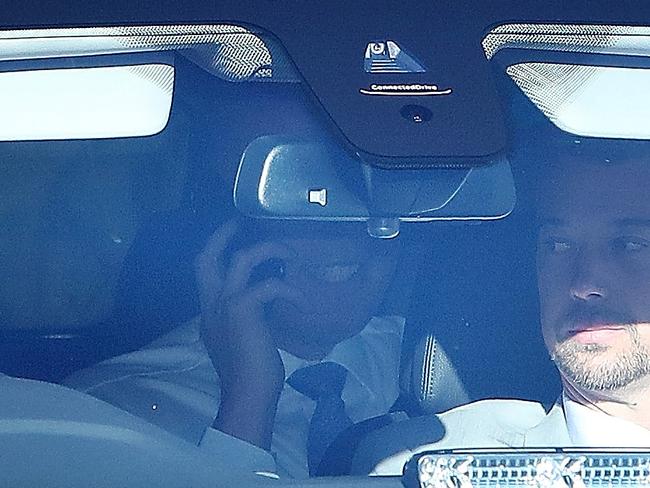 Peter Dutton on the phone on the way into Parliament House today. Picture Kym Smith